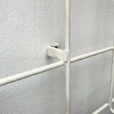 Minimalist white wire coat rack from mid-century Germany, 1960s.