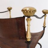 Curule armchair in wrought iron and leather