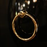 Black lamp in Hollywood Regency style