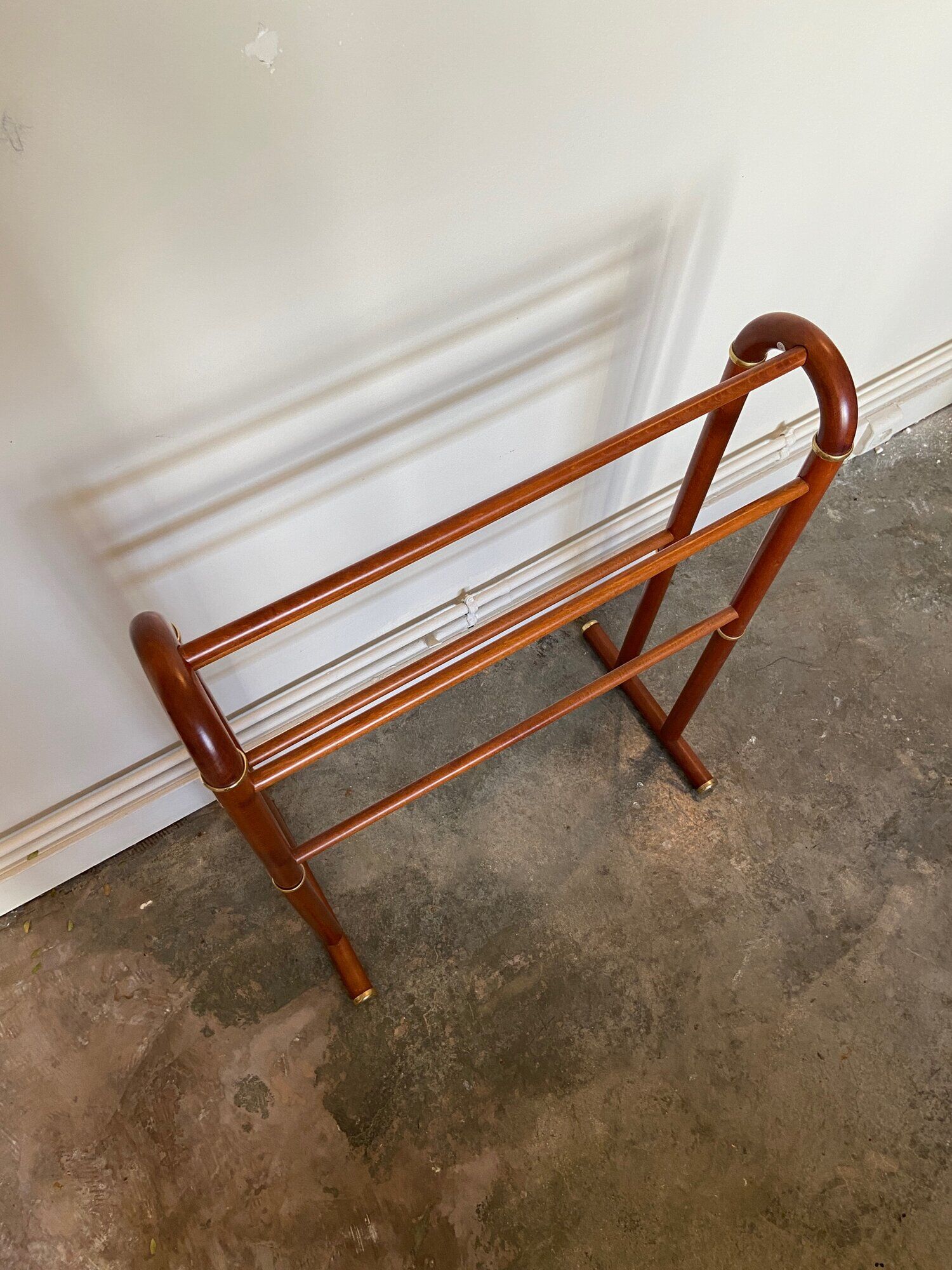 Dark wood towel rail