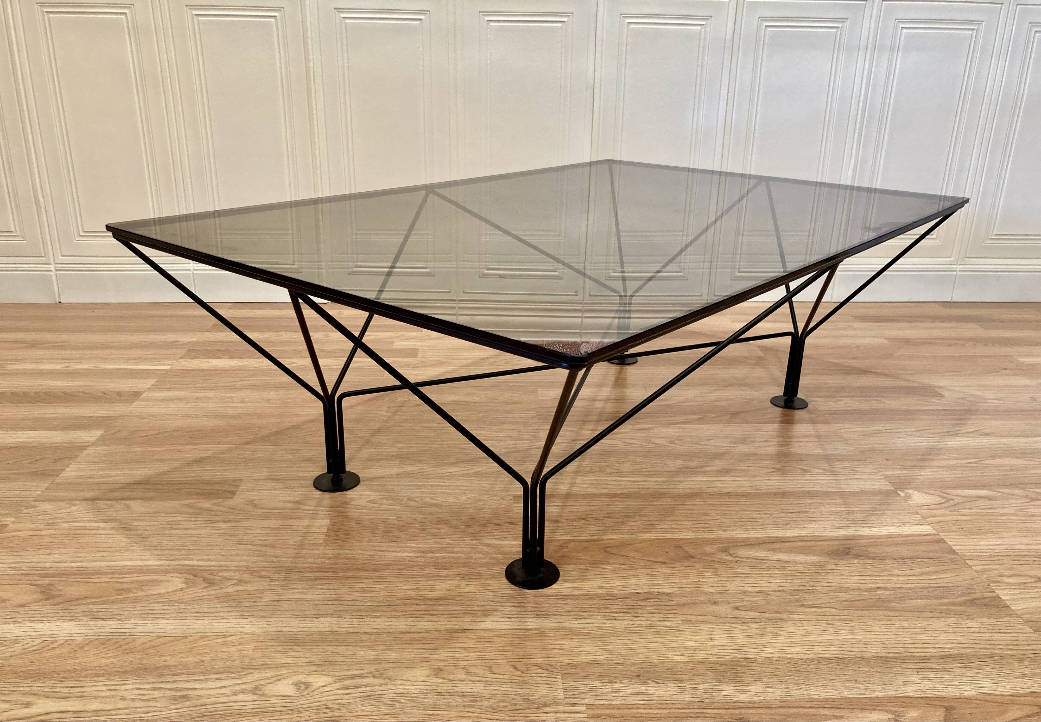 Designer glass and metal coffee table.