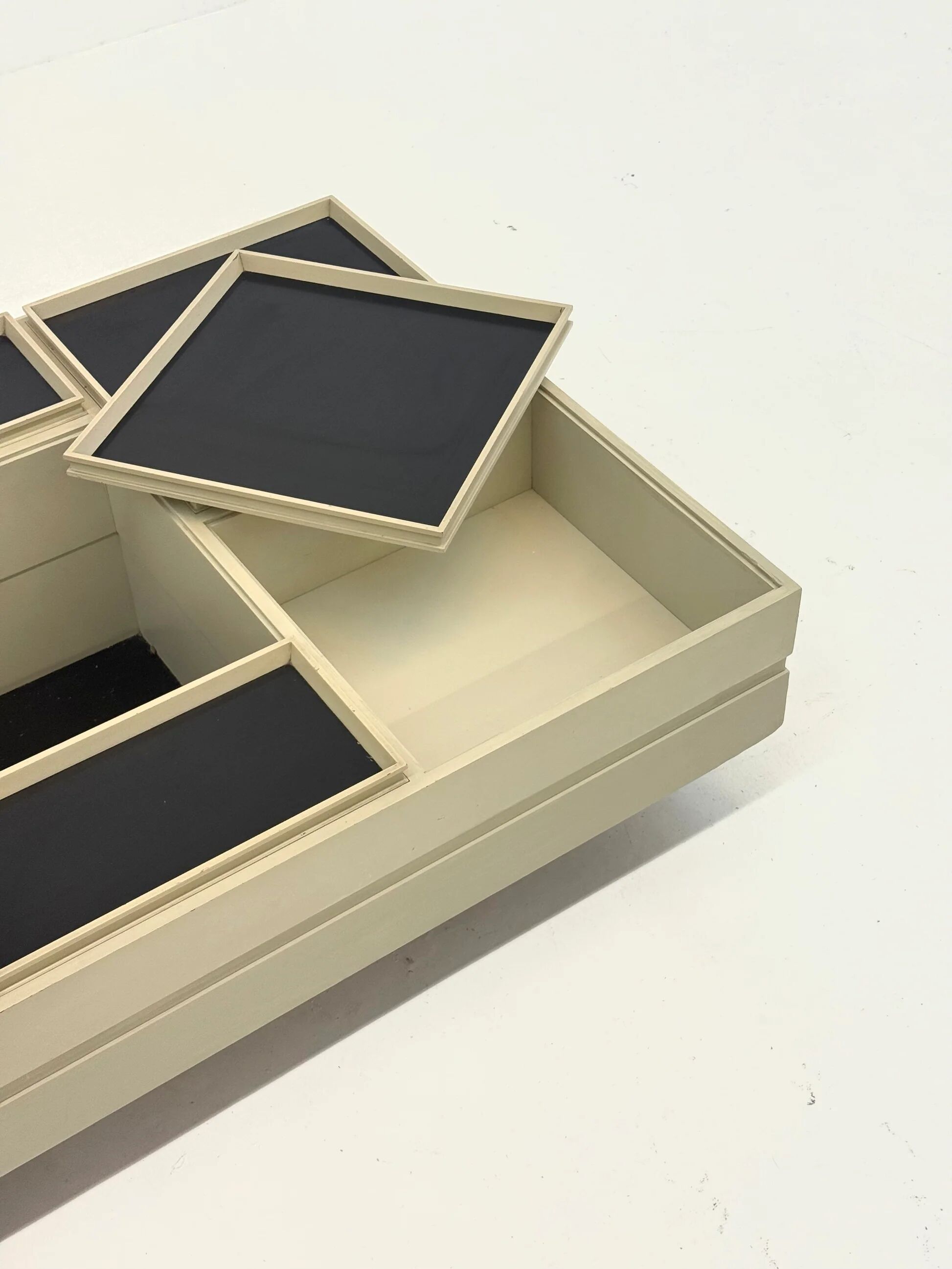 Modular white coffee table designed by Carlo Hauner for Forma