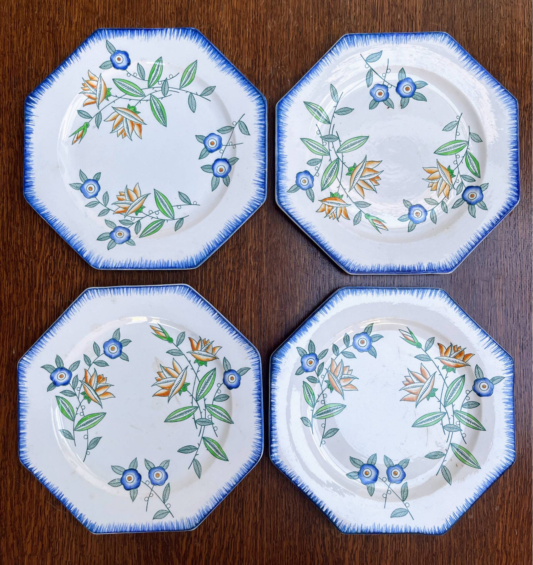 Set of 4 antique Longwy starter or dessert plates.