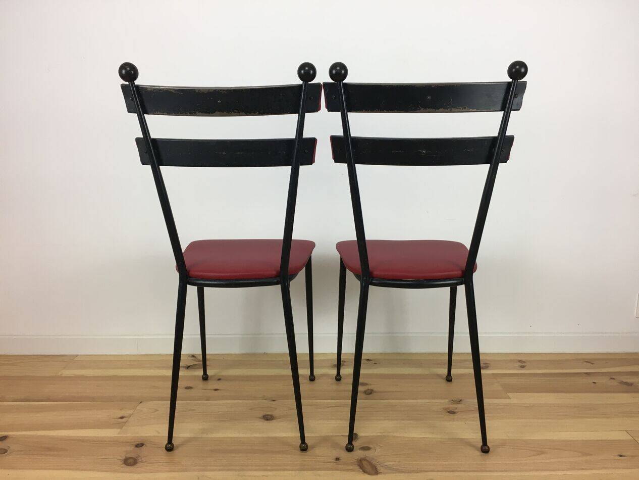 Pair of 1950s chairs in metal and red faux leather, Gueden-Adnet style.