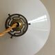 Suspension en opaline blanche et griffe en laiton