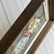 Vintage painting of flowers in a vase.