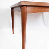 Dining table in teak with extension plates, of Danish design, 1960s