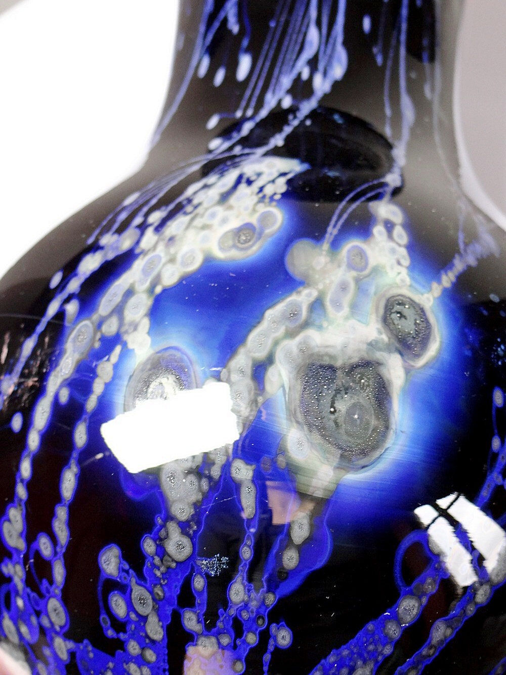 Large vintage purple art glass vase with silver glitter inclusions.