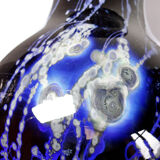 Large vintage purple art glass vase with silver glitter inclusions.