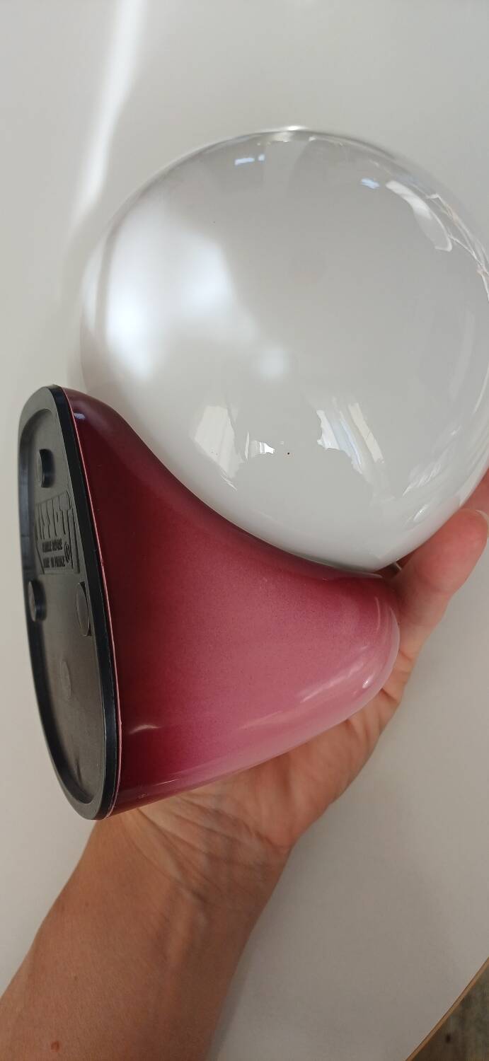 Pair of Tissot wall lights from the 70s with pink opaline glass in space age style.