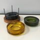 Set of 3 stackable glass catchalls with a teak base.