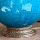Elegant turquoise crackled ceramic ball lamp, on a br base