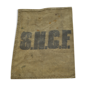 Sac en toile de jute qui permettait au transport