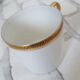 Limoges porcelain coffee cups, white and gold