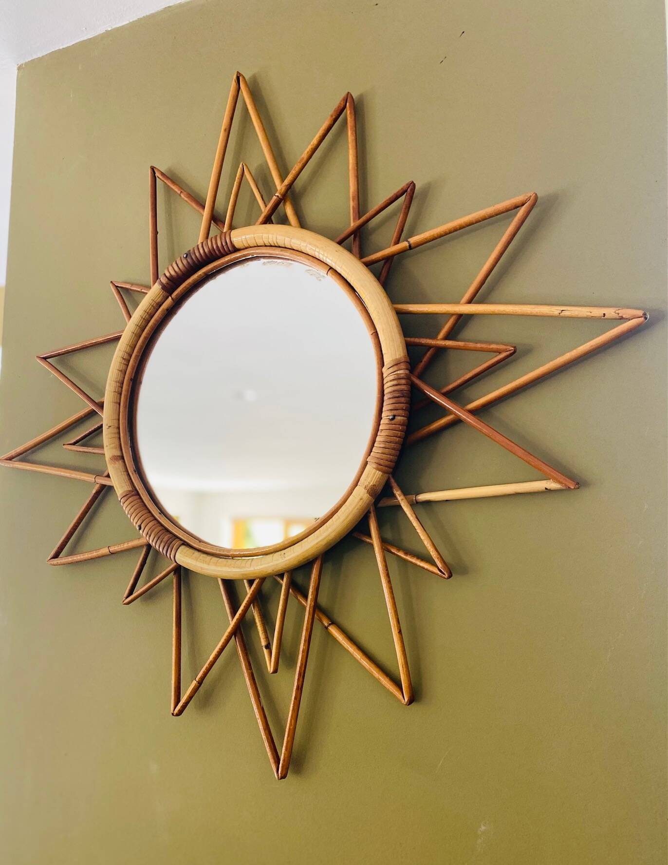 Vintage 60s/70s rattan sun mirror.