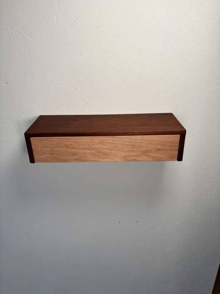 Vintage floating commode in teak and beech wood from the 1960s.