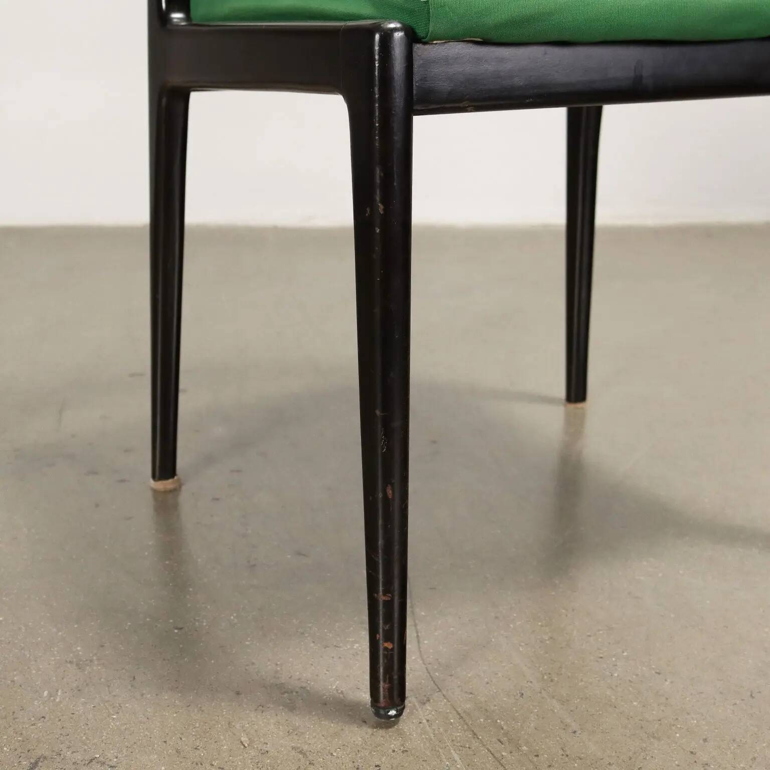 Vintage 1960s ebony wood chairs, foam padding, fabric.