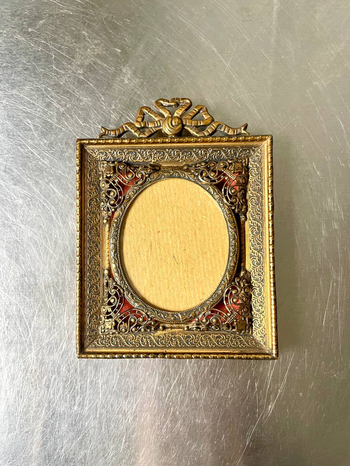 Antique metal frame gold coloured brass   frame 10.5 cm x 9 cm  convex glass