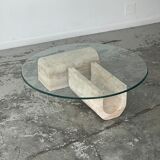 Coffee table in travertine and glass