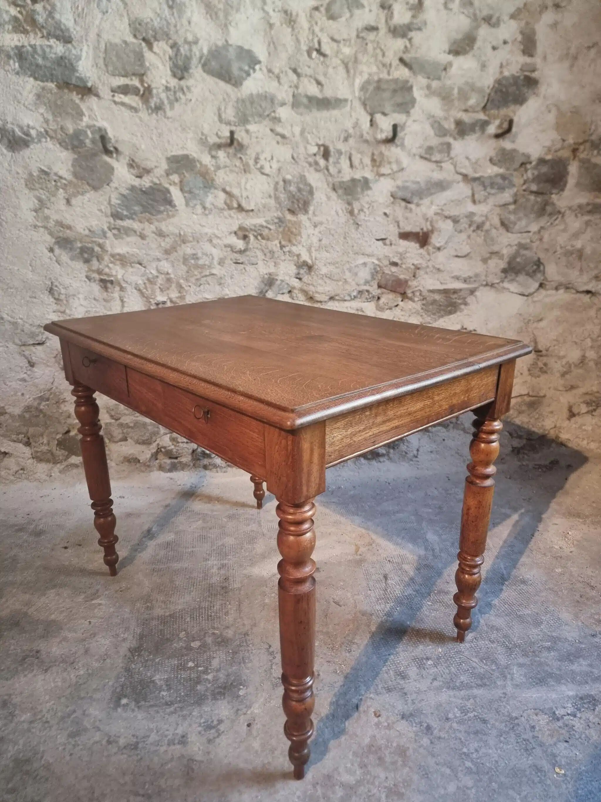 Antique French oak writing desk with 2 lockable drawers, circa 1920.