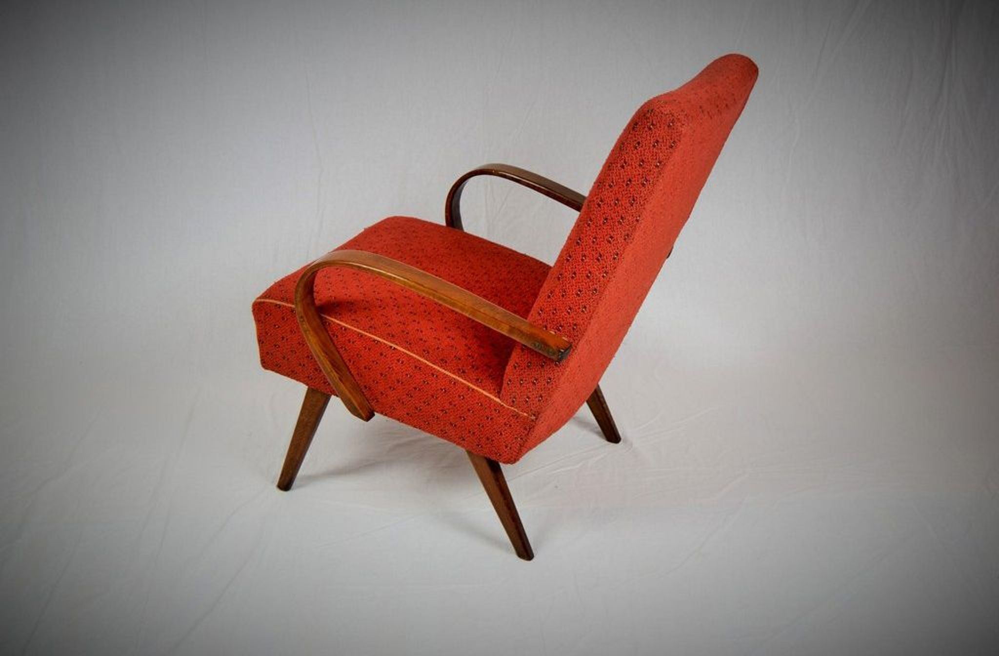 Curved wooden armchair from Ton 1960