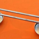 Former industrial-style wall coat rack