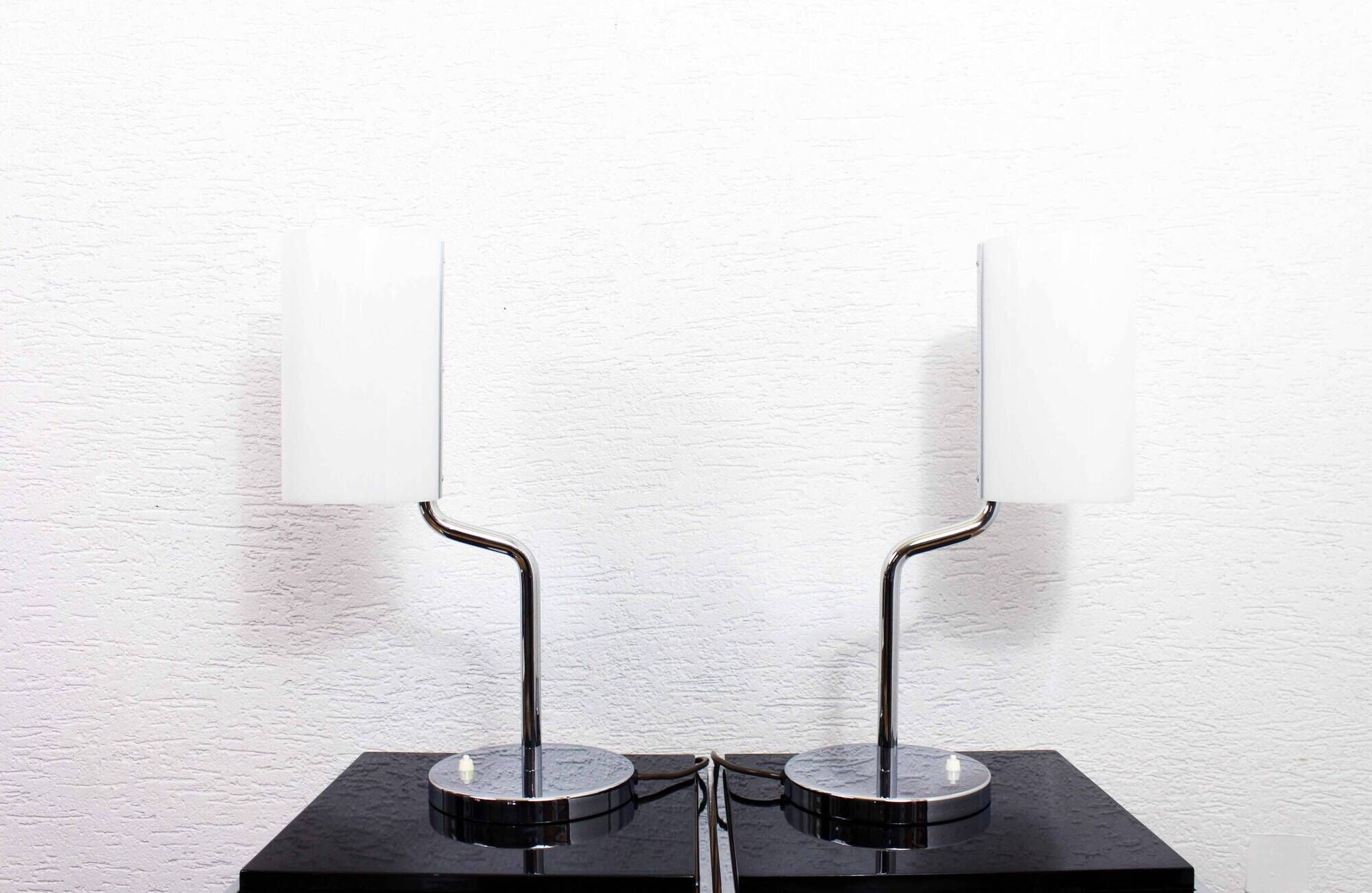 Pair of Italian chrome metal and white acrylic lamps