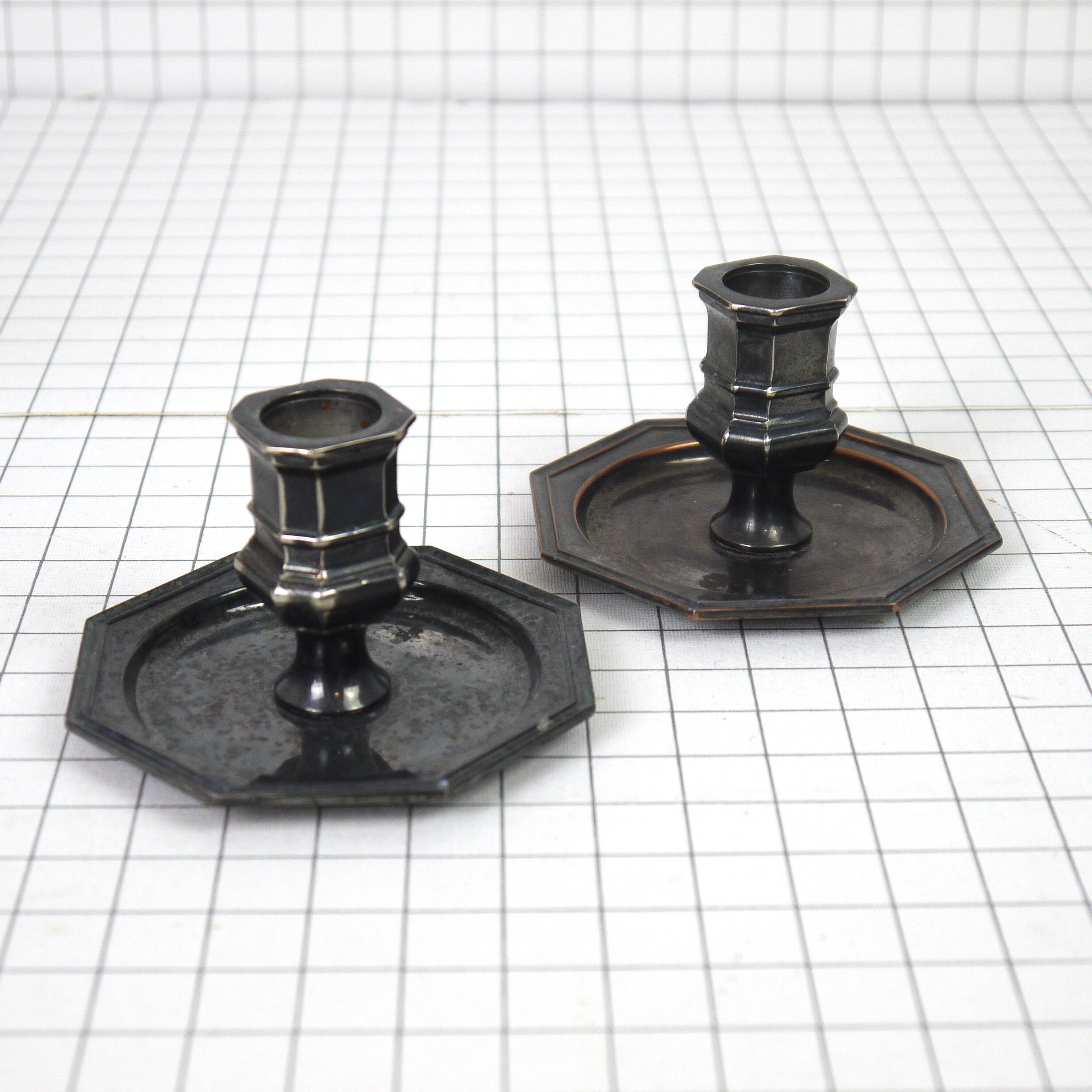 Pair of metal candlesticks