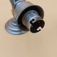 Metal wall light with opaline globe