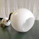 Swan neck wall lamp in gilded brass and opaline globe - mid-20th century