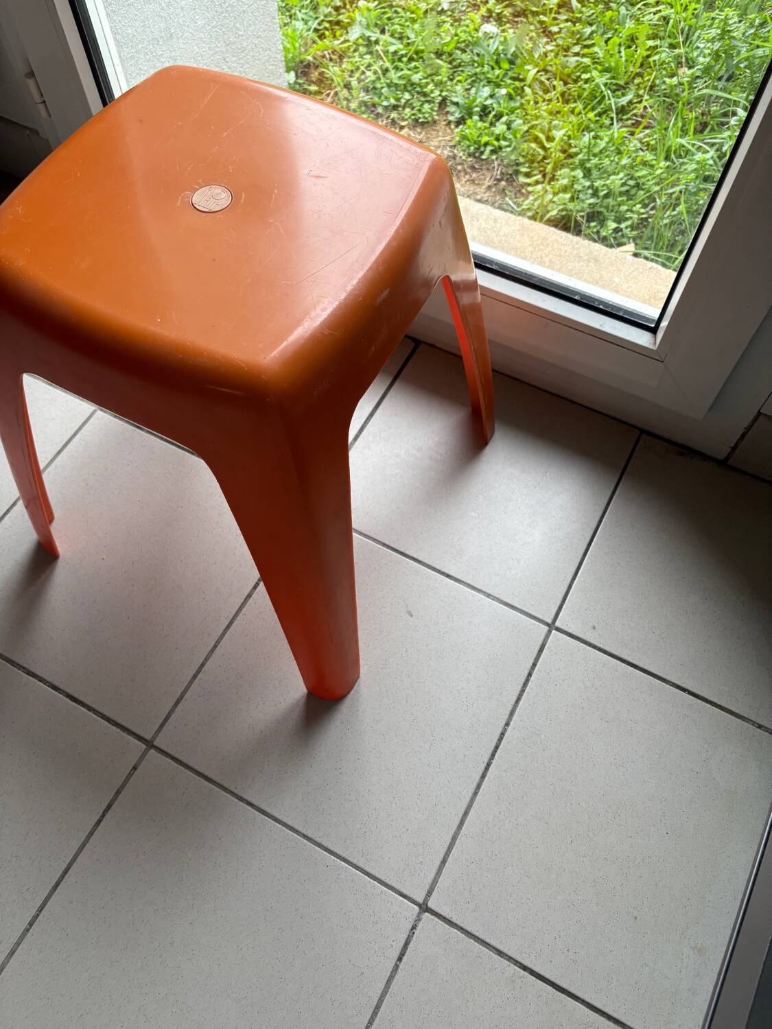 Vintage orange Flair stool from the 70s