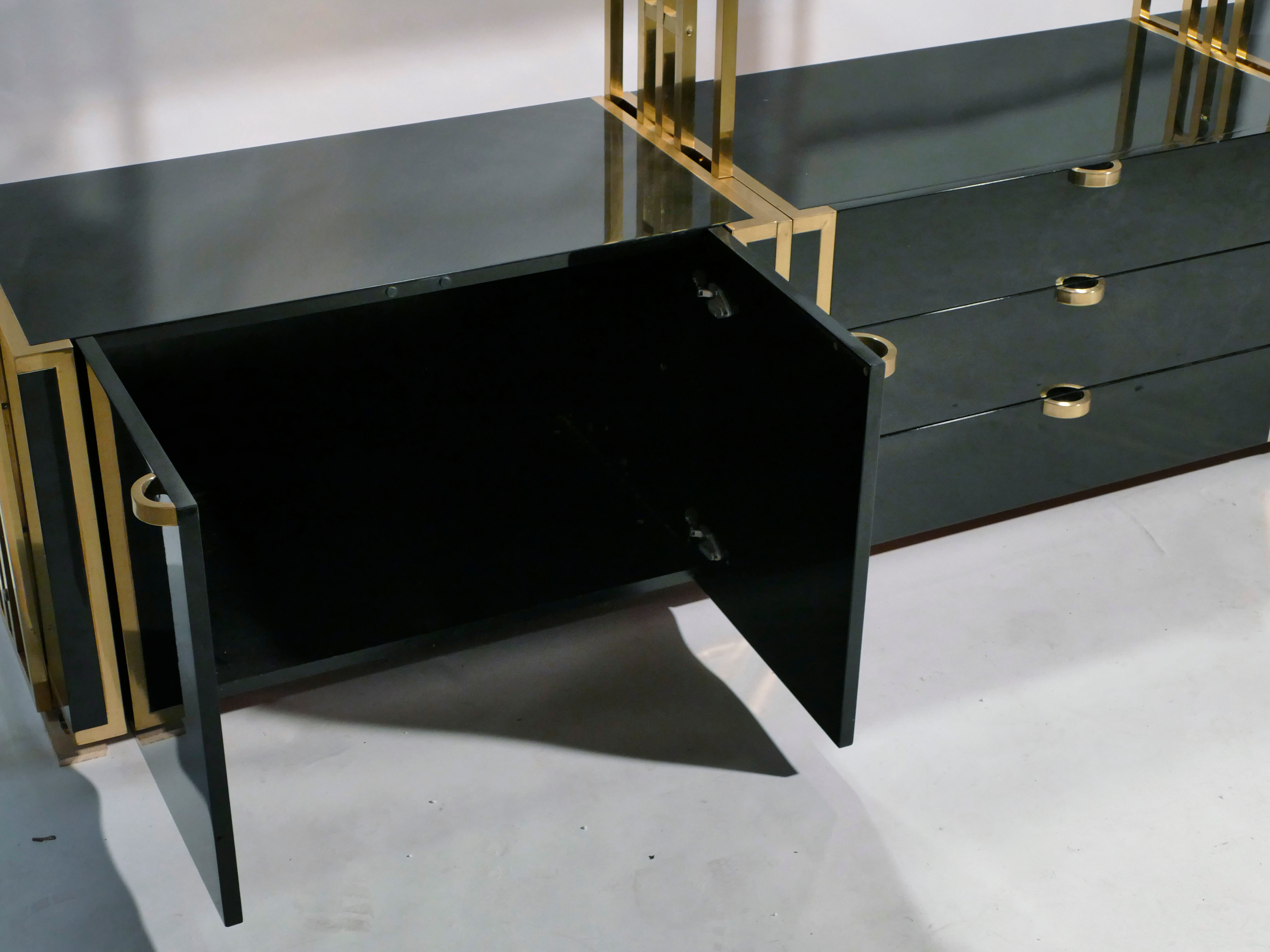 Brass laced library shelf by Kim Moltzer 1970
