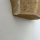 Vintage wall lamp, grainy beige plaster, France 1960