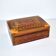 Vintage wooden box with straw marquetry and mother-of-pearl decoration.