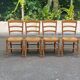 4 solid wood and straw Louis Philippe chairs from the 1960s.