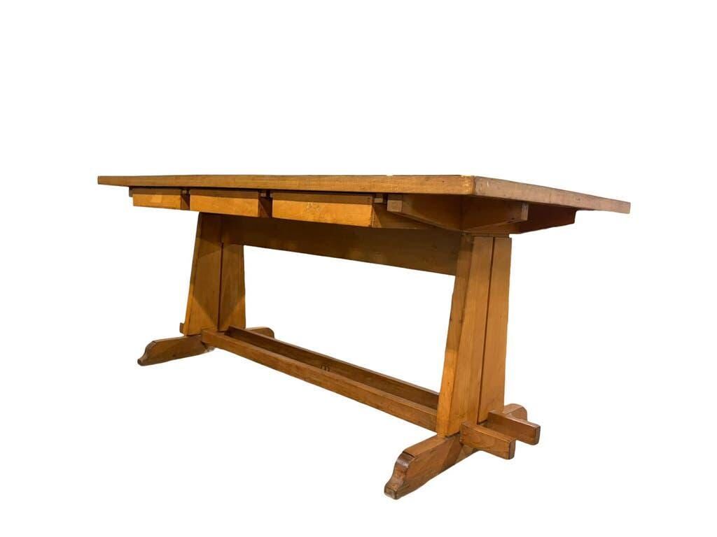Vintage wooden table with a yellow formica top.