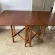 Vintage Scandinavian style wooden folding table in teak from the 1960s