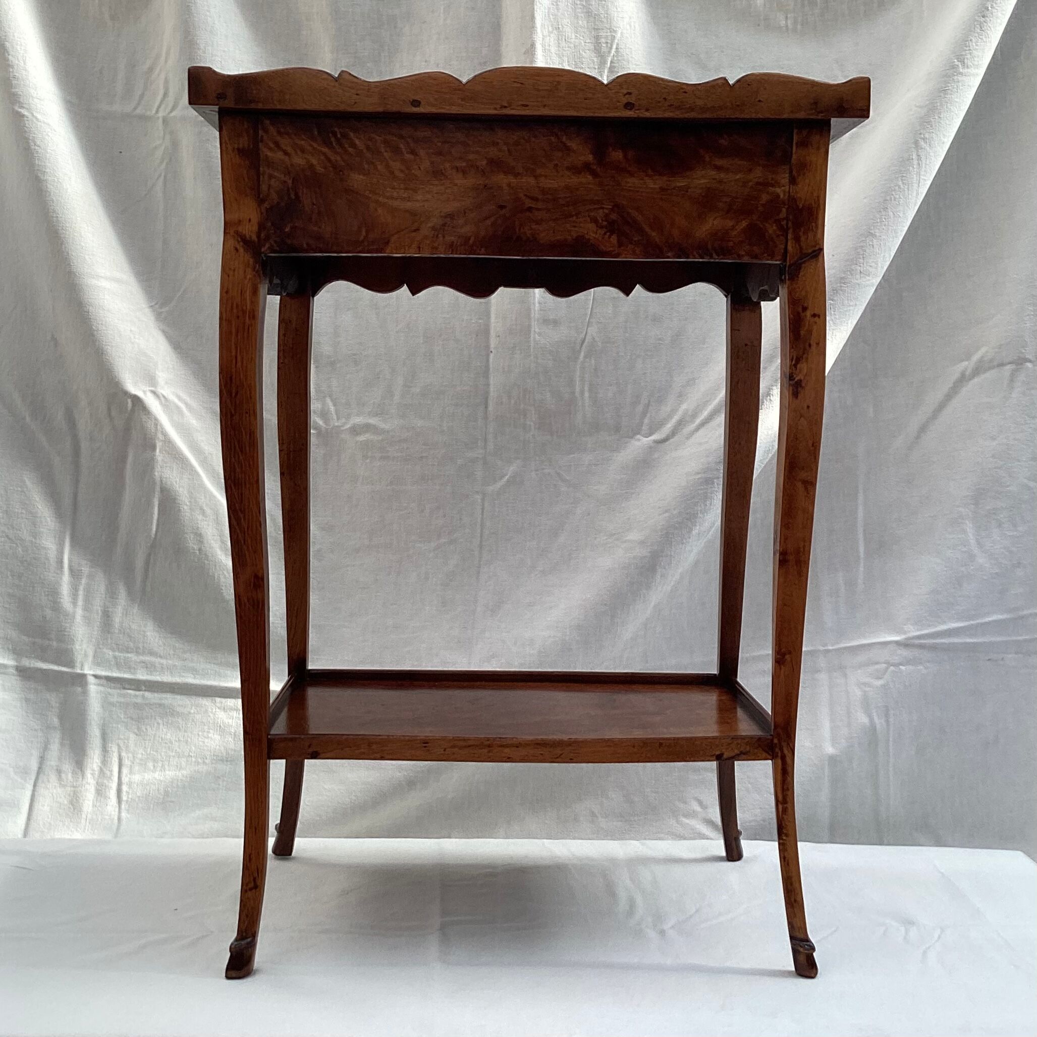 Old wooden side table with marquetry