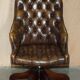 Fauteuil Chesterfield vintage en cuir vieilli