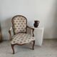 Fauteuil cabriolet de style Louis XVI garniture tapisserie fleurie