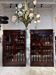 Pair of Empire period mahogany bookcases with flame pattern from the 19th century.