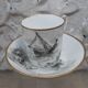 Tasse et sous tasse décor en grisaille porcelaine de Paris XIXème signée