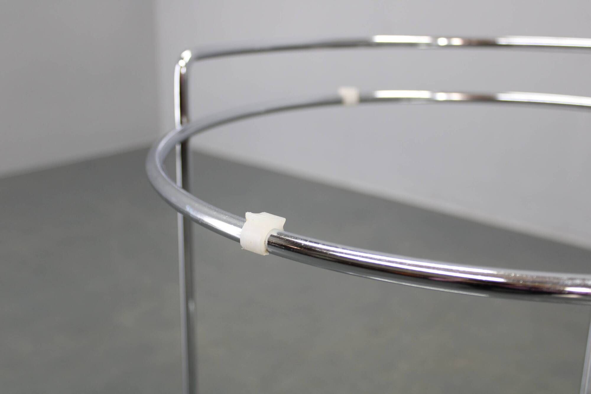Mid-century round serving table, chrome and glass, Italy, 1980s