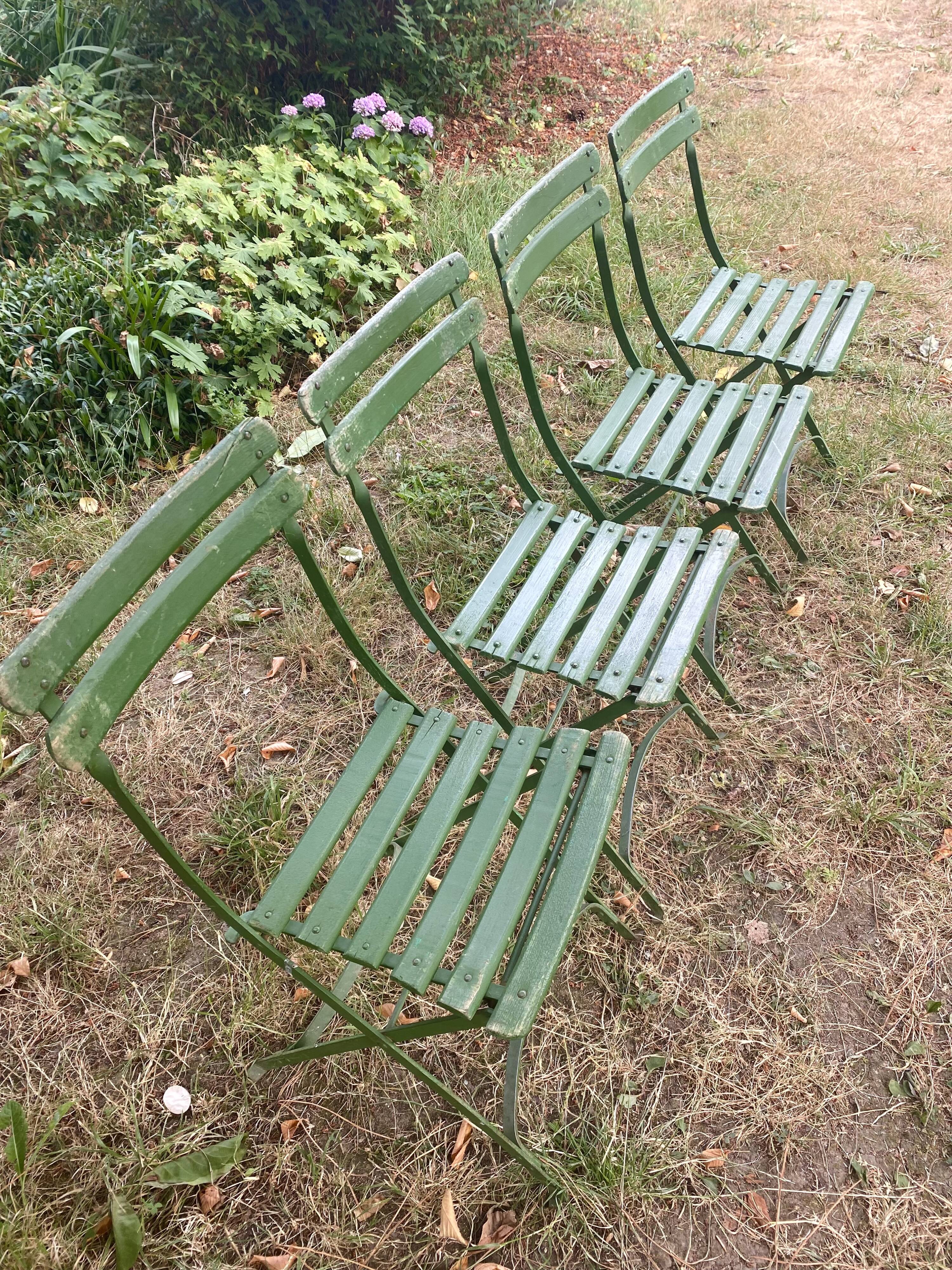 Antique folding garden chairs with wooden slats