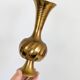 Solid brass Midcentury vase in trumpet shape with twisted details.