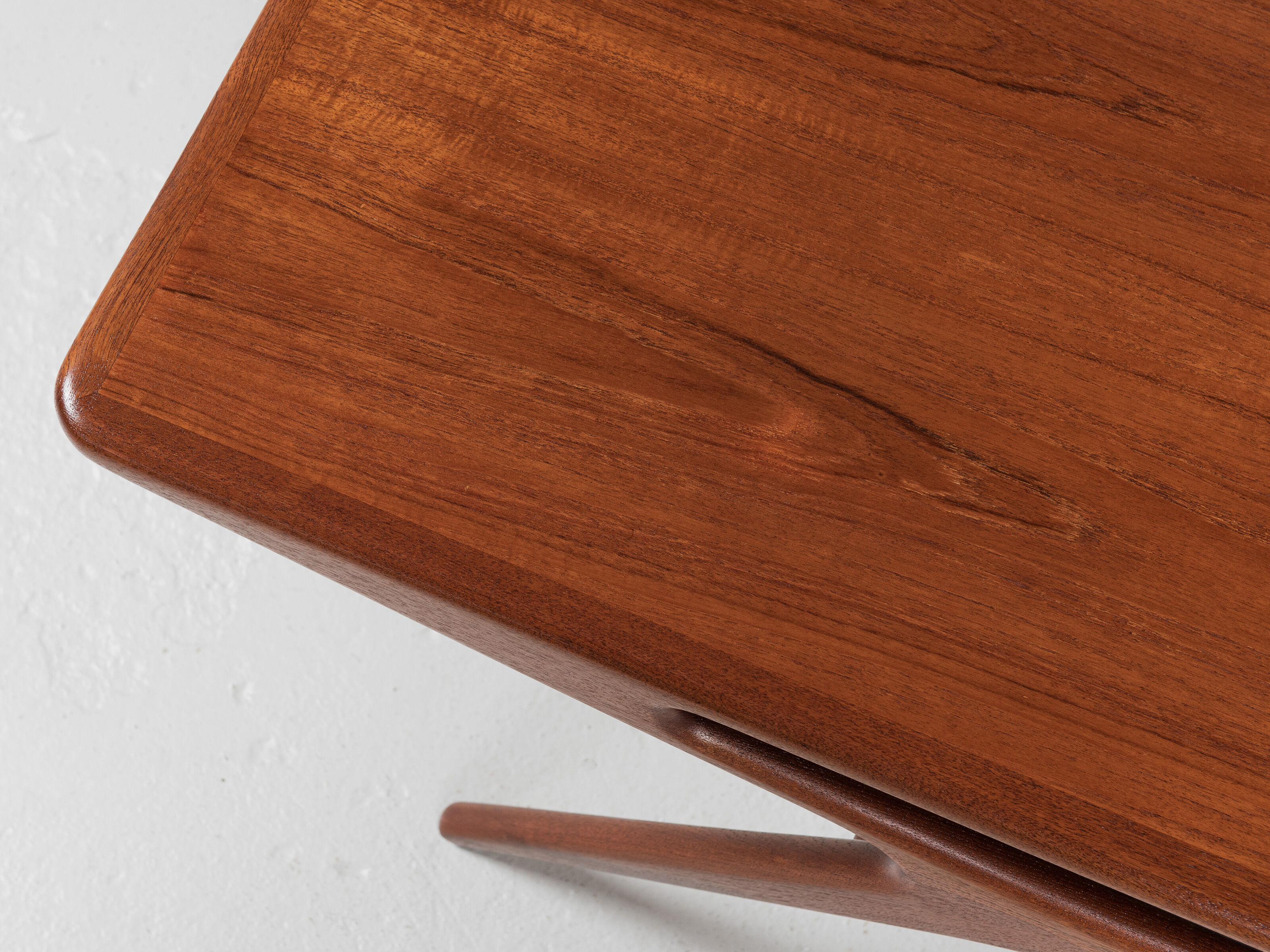 Midcentury danish smile coffee table in teak by johannes andersen for silkeborg 1950s