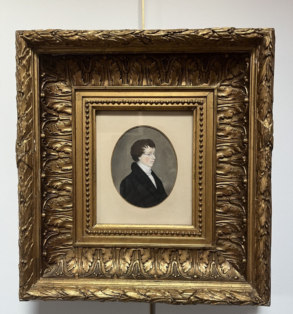 German school (?) of the early 19th century, Portrait of a young man wearing glasses.