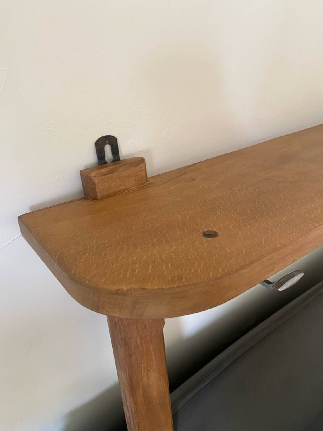 Wall-mounted coat rack with vintage hooks