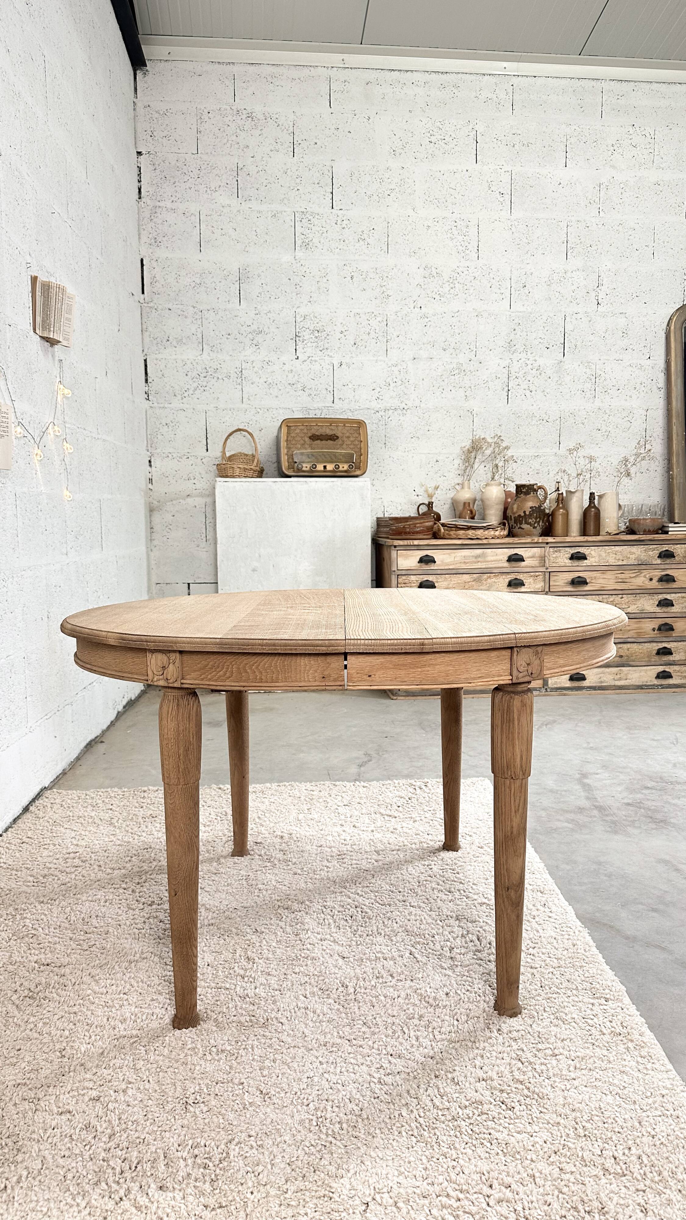 Old oval raw wood table