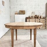 Old oval raw wood table